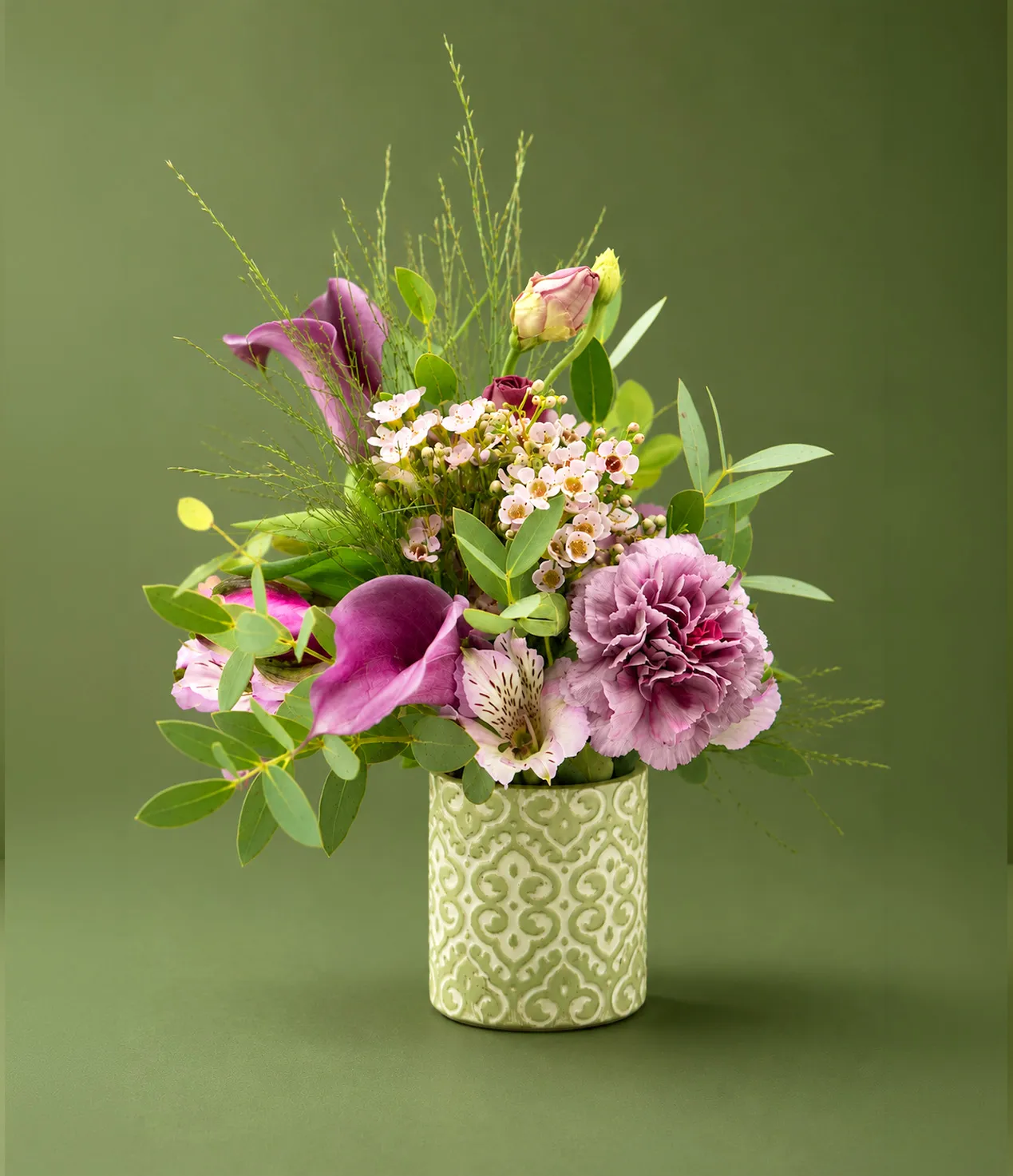 Colorful flowers arranged in a vase